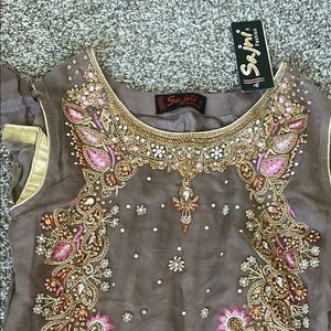 Brand new Pakistani dress with intricate work all over the shirt